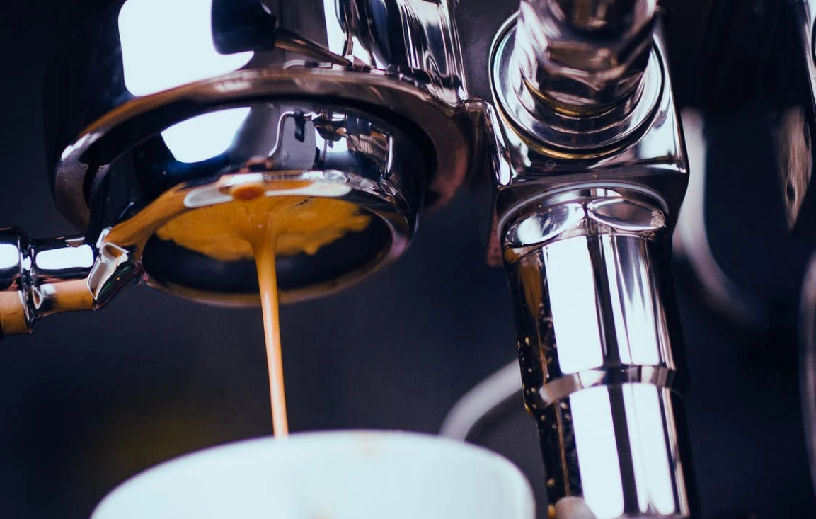 coffee pouring from coffee machine